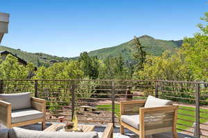 Balcony with a mountain view and an outdoor living space