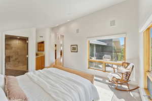 Bedroom with vaulted ceiling, carpet, recessed lighting, and baseboards