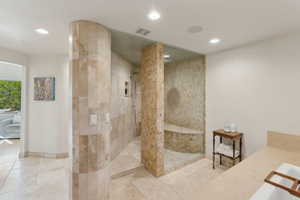 Full bathroom with a walk in shower, recessed lighting, tile patterned flooring, vanity, and baseboards