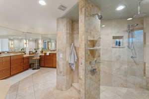 Bathroom with walk in shower, vanity, recessed lighting, and tile patterned flooring