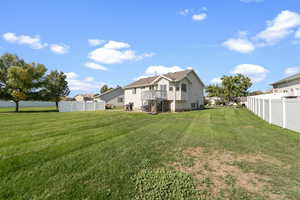 View of yard featuring a wooden deck