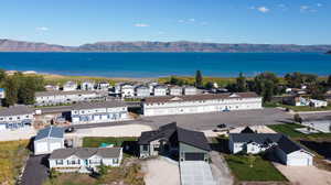 Aerial view with a water and mountain view