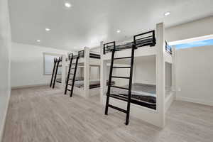 Unfurnished bedroom featuring light hardwood / wood-style floors