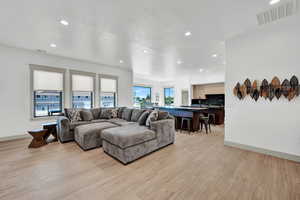 Living room featuring light hardwood / wood-style floors