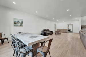 Dining room with light wood-type flooring