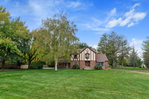 View of front of home with a front lawn