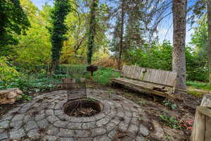 View of patio / terrace with a fire pit