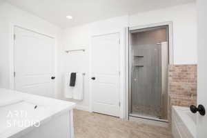 Bathroom for bedroom 7 featuring vanity, an enclosed shower, and tile patterned flooring