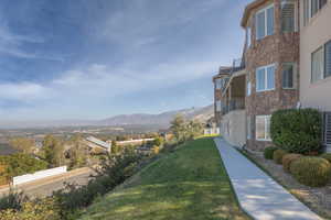 View of home's community featuring a yard and a mountain views to the North East.