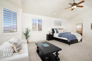 Carpeted bedroom featuring multiple windows, high vaulted ceiling, and ceiling fan