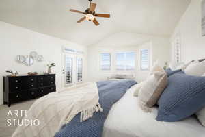 Carpeted bedroom featuring access to outside, lofted ceiling, and ceiling fan