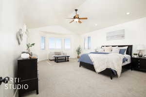 Bedroom featuring lofted ceiling, light carpet, and ceiling fan