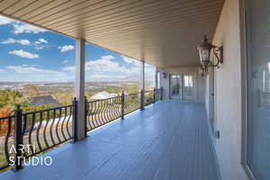 Balcony view off of recreation room featuring valley and mountain views.