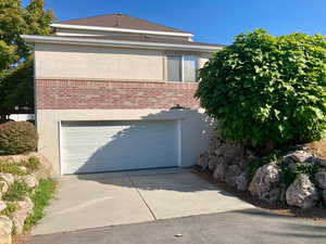 Exterior space featuring a garage