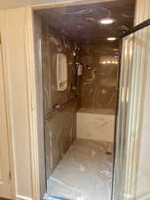 Bathroom with an enclosed shower