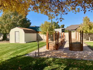 View of yard with a storage shed