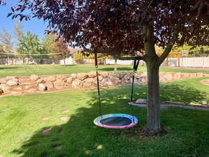 View of yard featuring volleyball court