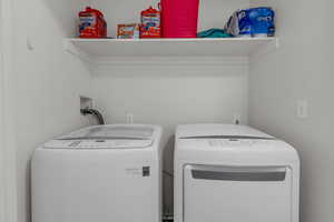 Laundry room featuring washing machine and dryer