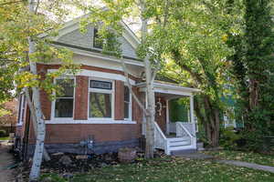 View of front of property with a porch