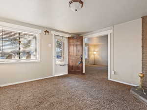 View of carpeted spare room