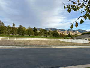 View of lot that backs to a beautiful golf course with a mountain view.