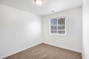 Unfurnished room featuring carpet floors