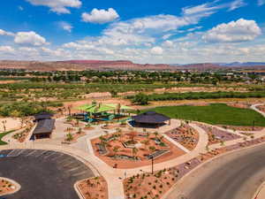 Birds eye view of property featuring a mountain view