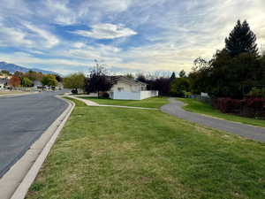 View of walking path that adorns the back of the property