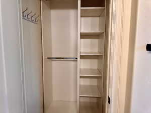 View of extra closet built in primary bathroom to add ample storage