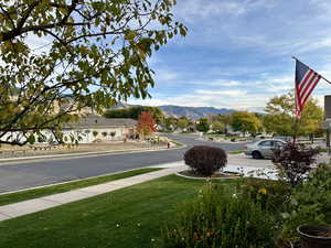 Quaint private street featuring a mountain view