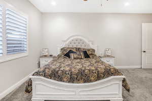 Bedroom featuring carpet flooring