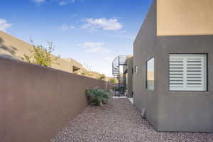 View of side of home featuring a patio