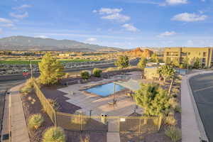 View of pool featuring a patio area and a mountain view