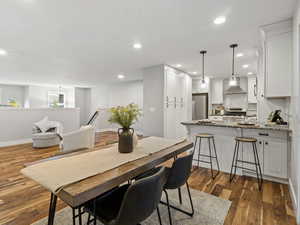 Dining space featuring dark hardwood / wood-style floors