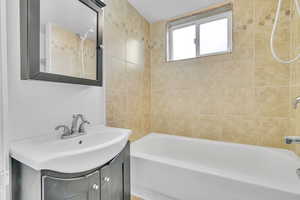 Tiled Full Bathroom in Basement