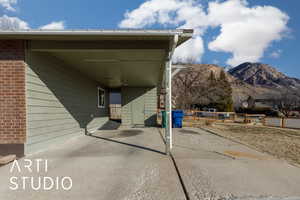 View of patio / terrace with a mountain view