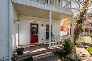 Second Front Entrance to property with a porch