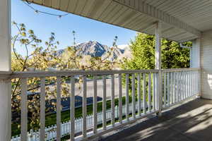 Balcony with a mountain view off Primary Suite