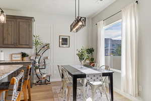 Dining area featuring light wood-type flooring