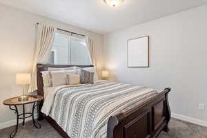 View of carpeted bedroom