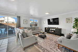 Tiled living room with ornamental molding