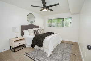 Bedroom with carpet flooring and ceiling fan