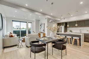 Dining area featuring light wood-type flooring