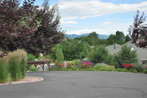 Manicured yard with mountain views