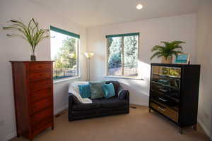 Master Bedroom sitting area with light colored carpet