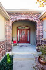 Entrance to property with covered porch