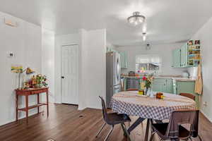 Dining space featuring dark hardwood / wood-style floors