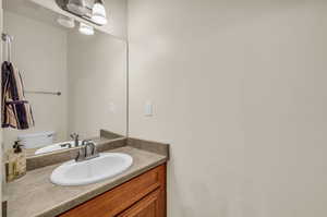 Bathroom with vanity and toilet