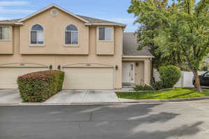 View of front of property with a garage