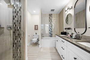 PRIMARY BATHROOM WITH SEPARATE TUB & SHOWER & DUAL VANITIES